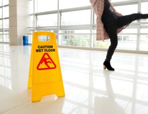 What All Slip And Fall Accident Victims Should Know. Woman slipping.