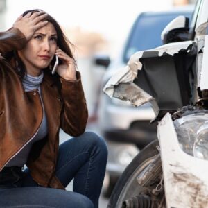 Your personal injury lawyer consultation. Woman after a car accident.