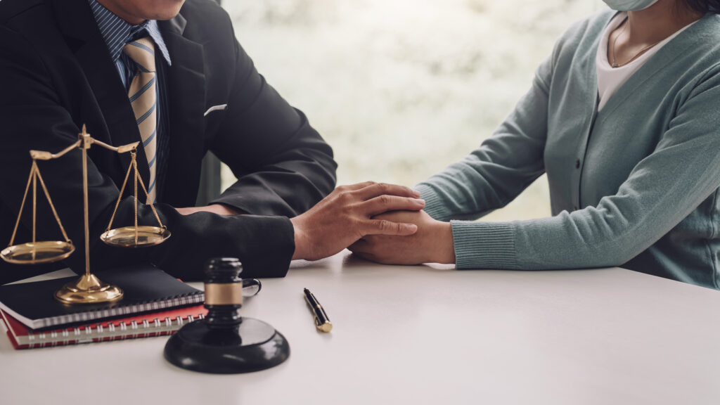 Businessman man lawyer entrusts trust work to customer shaking hands at office.