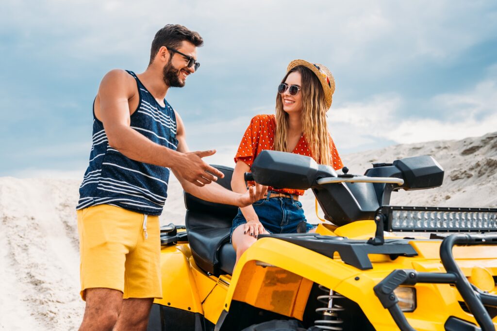 Navigating The Risks Of ATV Riding | Cantor Injury Law | St. Louis, MO Navigating The Risks Of ATV Riding. Couple on ATVs at the beach.