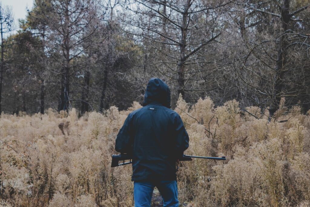 A hunter with a gun